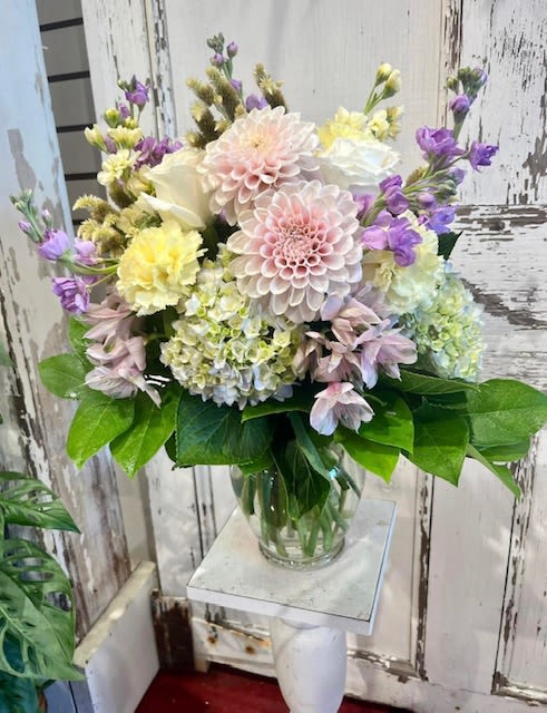 Pretty Pastels - These colors are so refreshing for Spring! Beautiful pastels in pink, yellow, blue, and lavender will be sure freshen up the recipients home for Spring. 