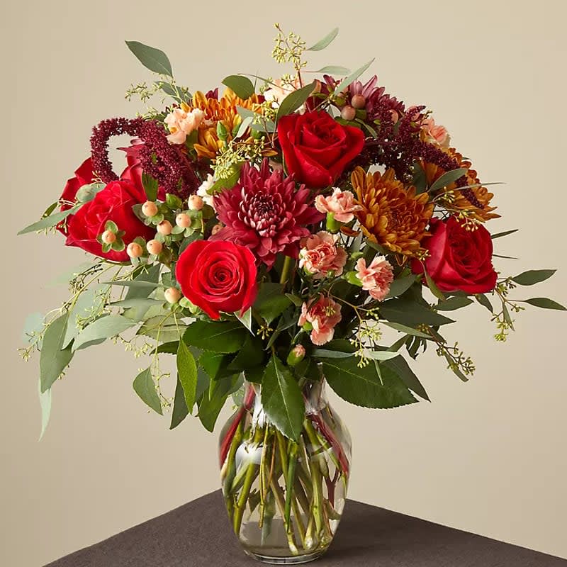 Grand Bunch Flower Bouquet - Are you looking for something to warm their day? This great bunch of blooms include roses, carnations, and eucalyptus. Approximately 16" H x 12" W. 