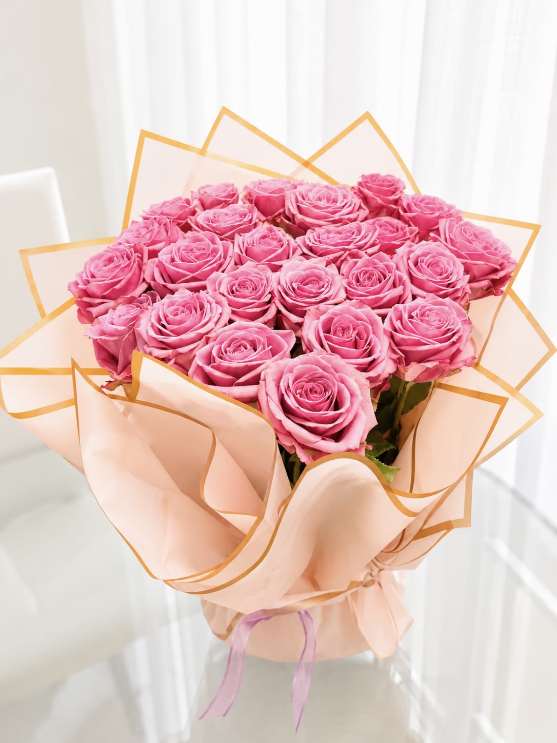Pink Heart - This arrangement is a bold expression of Love- intense, elegant, and impossible to ignore. A lush dome of pink roses forms a perfect heart shape. 
