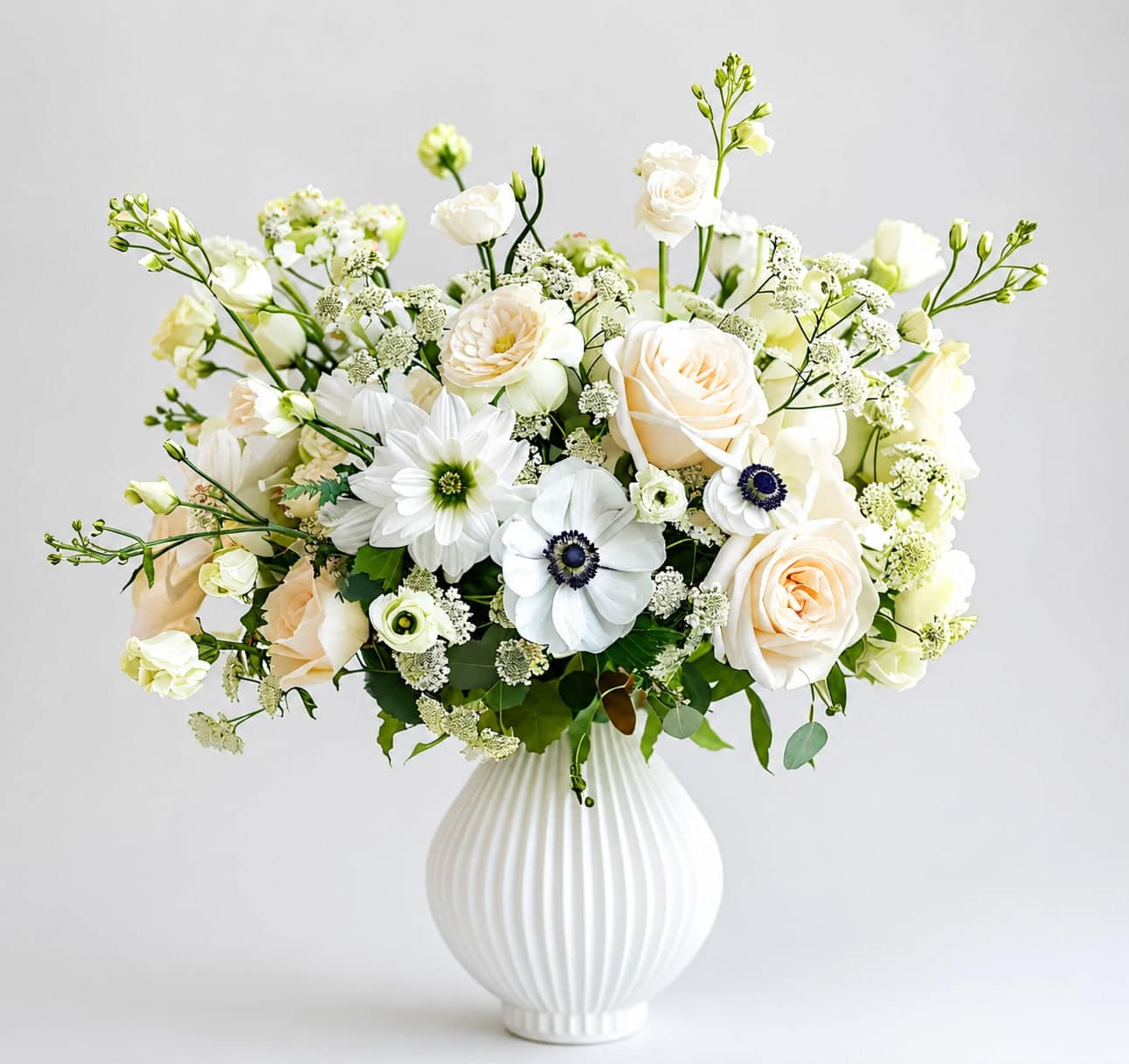 Bohemian Chic - Spread love with this stunning bouquet, full of heartwarming seasonal blooms. PLEASE NOTE: Flower stems in the image are NOT GUARANTEED, we will use seasonal flowers in keeping with the holiday theme. Containers will vary!