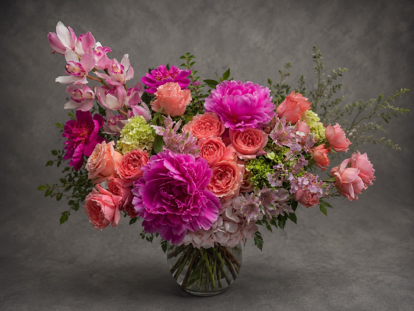 Peony Bliss - Showcasing breathtaking peonies alongside premium roses, orchids, hydrangea, and delicate seasonal blooms, Peony Bliss is a luxurious floral statement overflowing with beauty and charm. Perfect for making a lasting impression.