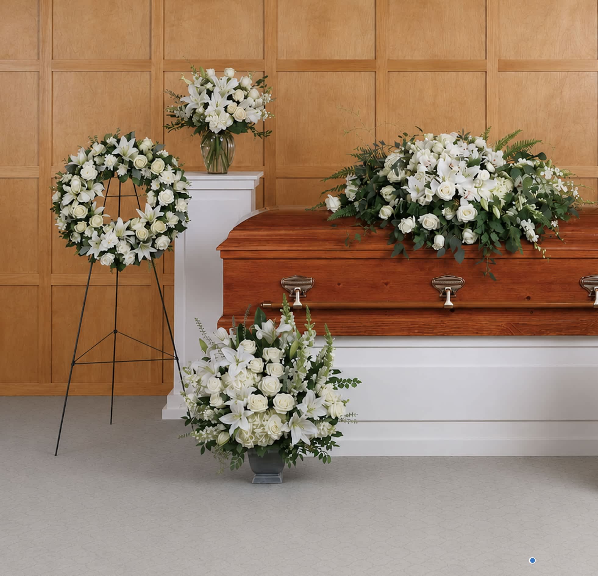 Grandest Glory Collection - This glorious collection of six hand-made sympathy pieces features pure white roses and lilies for a beautiful sense of peace and tranquility. Save $50 by ordering the collection.