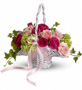 Flower Girl's Dream Basket - This perfect little basket of pink blooms and fresh greens is trimmed with pink organza ribbon.  A small princess basket overflows with roses, viburnum, green chrysanthemums and ivy.  Approximately 11 1/2" W x 9 1/2" H  Orientation: All-Around 