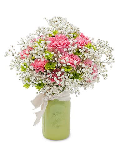 It's a girl! - A vintage jar, with pink Carnations, Baby's Breath, bright pops of green, and finished off with a linen tie.