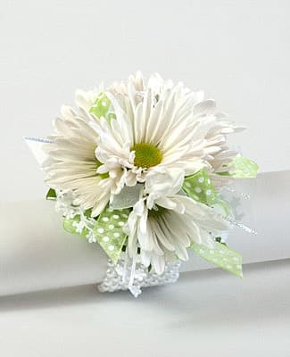 White daisy bouquet with green polka-dot ribbon