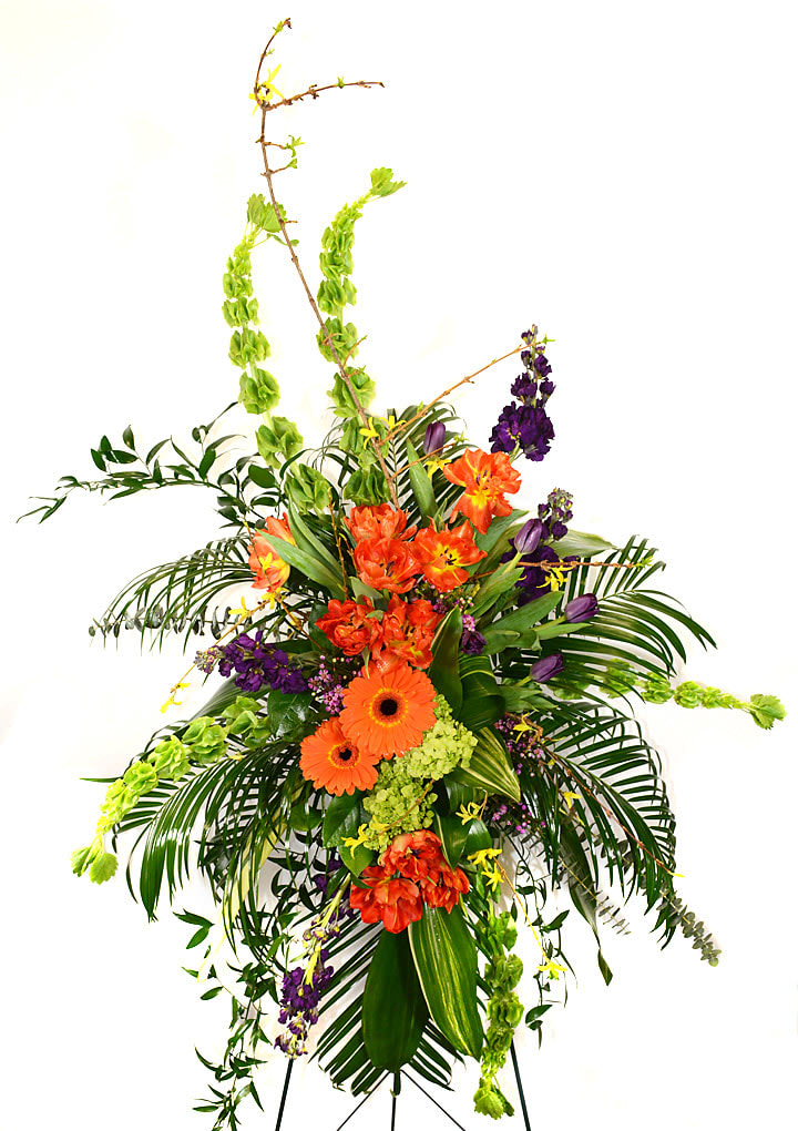 Tall tropical floral spray with orange and purple flowers