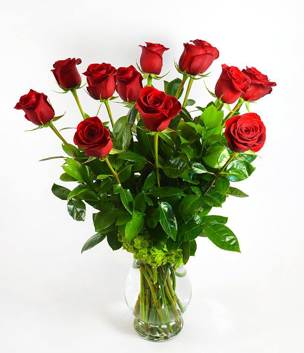 Bouquet of red roses in a clear glass vase
