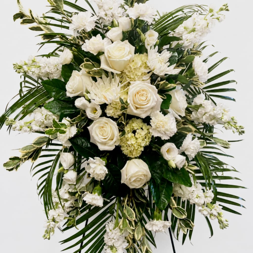 Morning Sunrise - Standing easel sympathy expression thoughtfully designed with all white flowers including white roses. A beautiful expression of sympathy for a loss of a special person.
