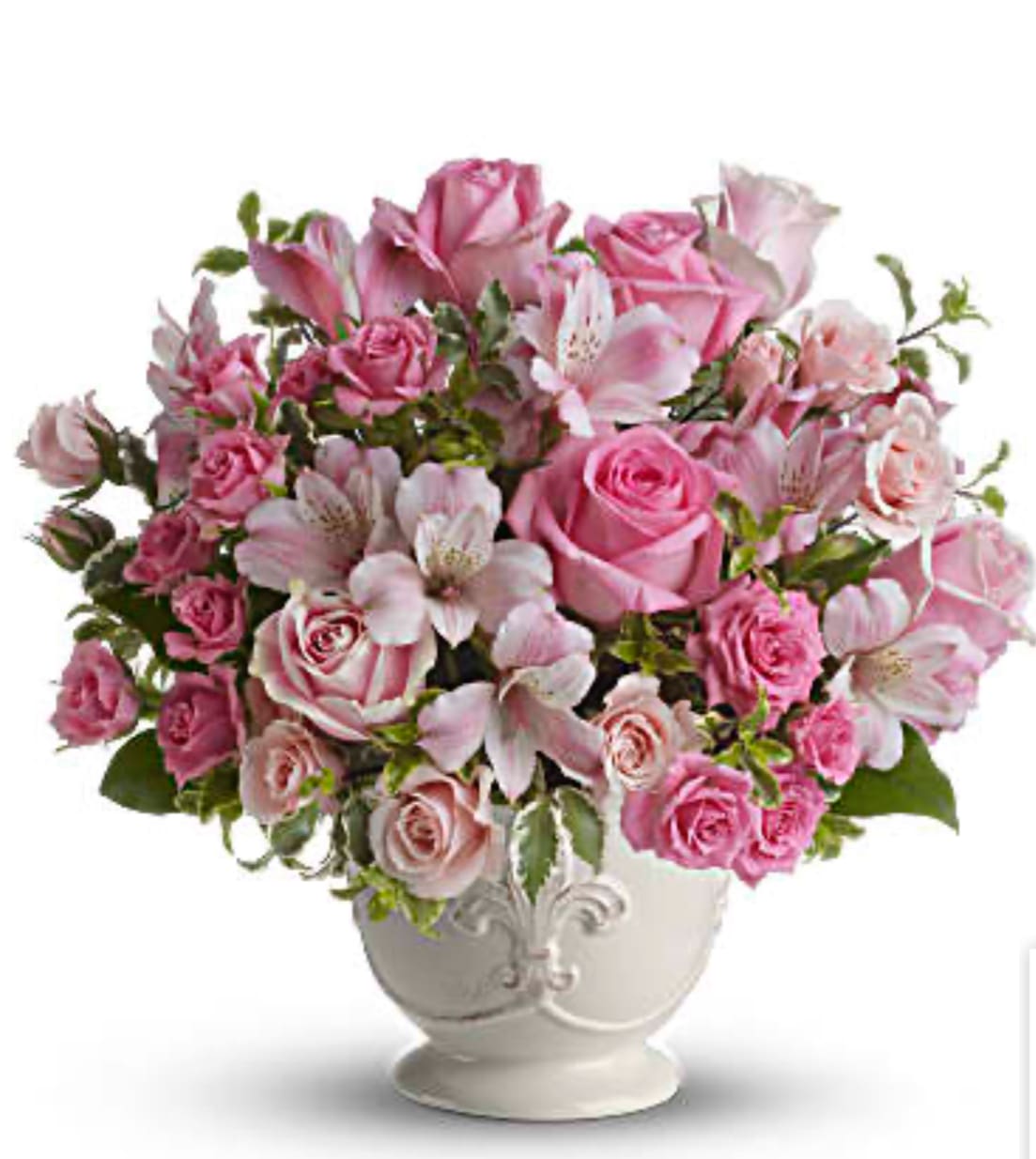 Pink roses and alstroemeria arranged in a white vase