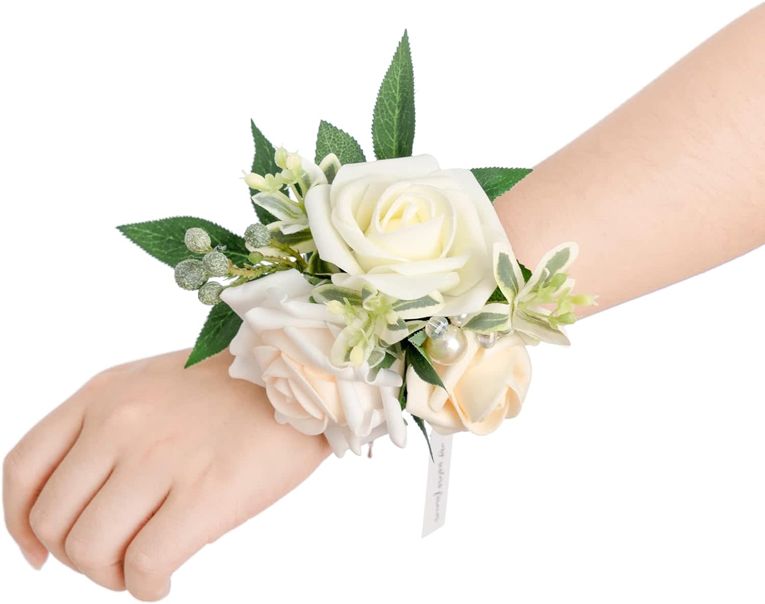 White rose wrist corsage with small accent flowers