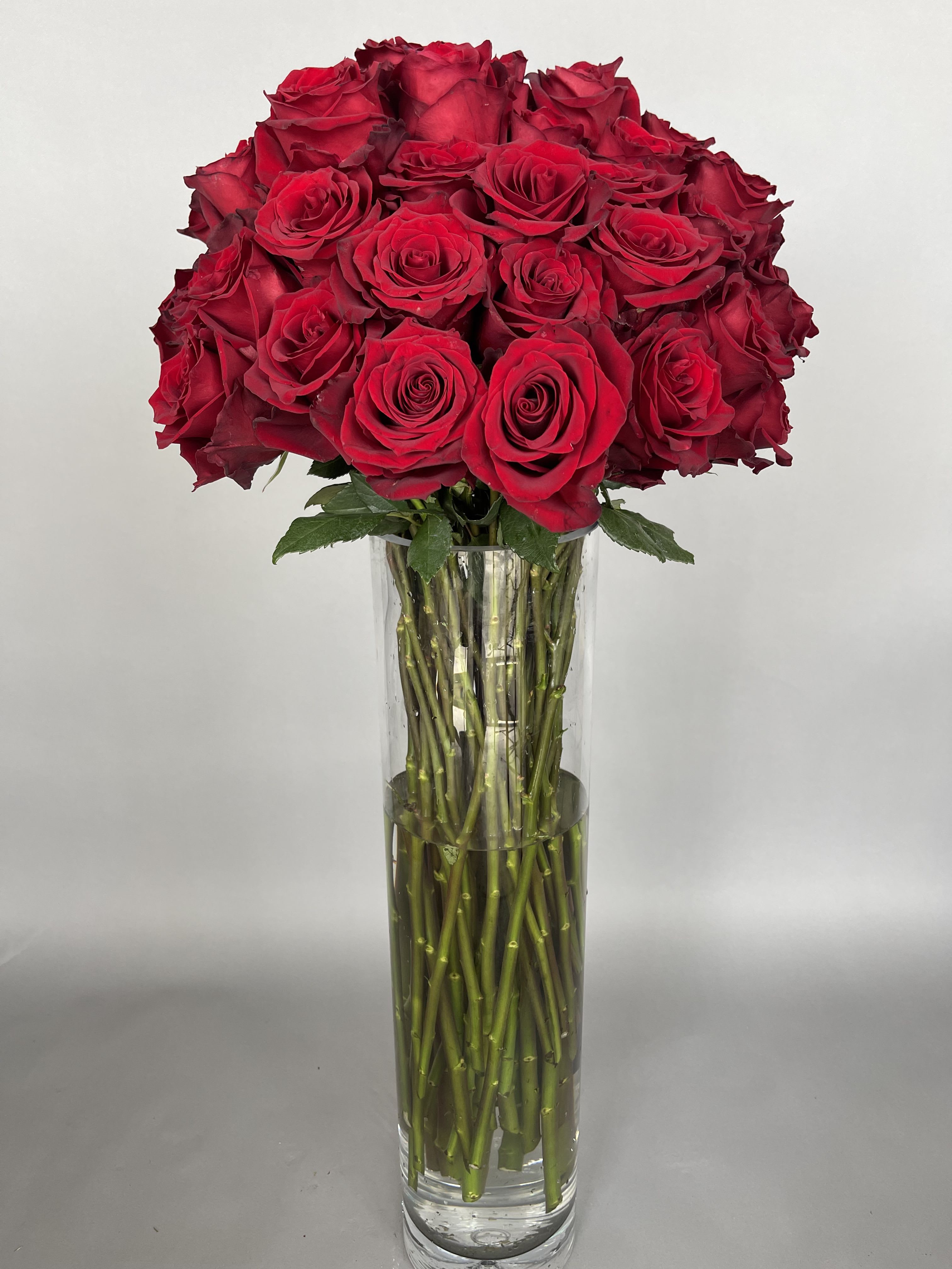 Classy and Elegant.  - 50 long stem roses.  