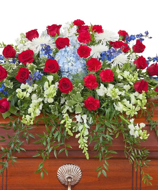 HONOR CASKET SPRAY - This beautiful red, white and blue casket spray gives tribute to the one who served with honor.  