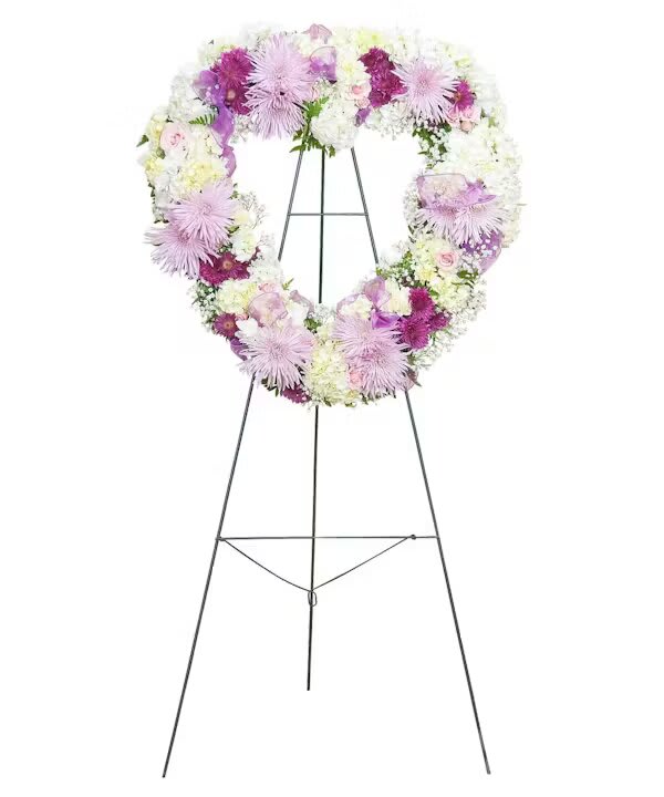 SWEETHEART STANDING SPRAY - Soft pastel pink and lavender blooms combine to make a sweetheart combination.   
