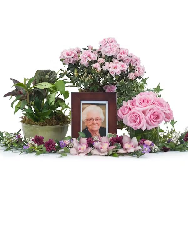 LOVELY LADY TRIBUTE - This collection of plants and flowers will make a special tribute to a lovely lady.  Inquire about color options.  *Picture and frame not included