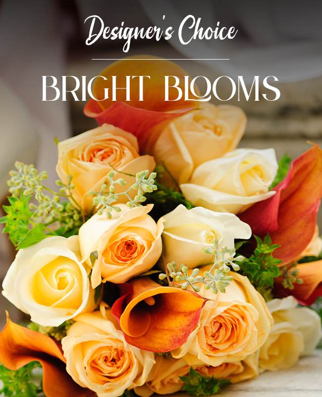 Bouquet of peach and cream roses with orange calla lilies