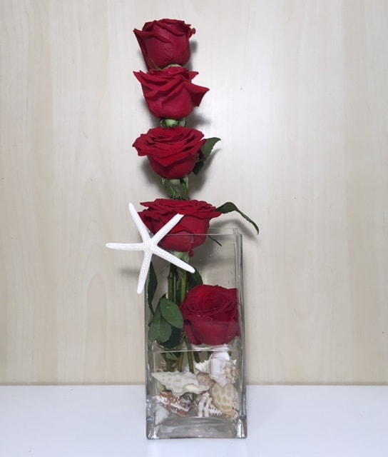 Sea Roses - 5 medium stem red Roses in tall glass vase with a sea star
