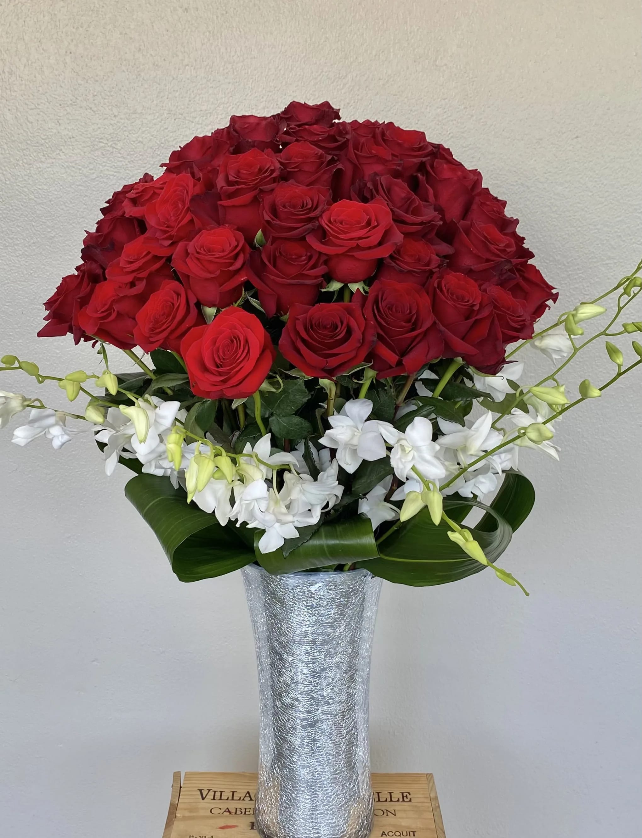 Roses &amp; Orchids  - 5 dozen Red Roses with orchid blooms 