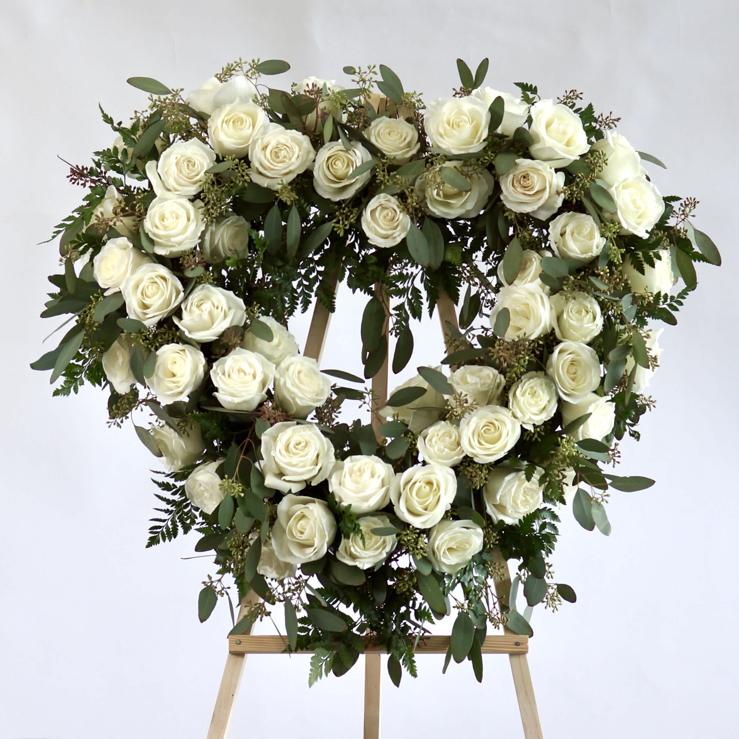Rose Heart Wreath - Over two dozen roses to offer your condolences on a 22” inch heart 