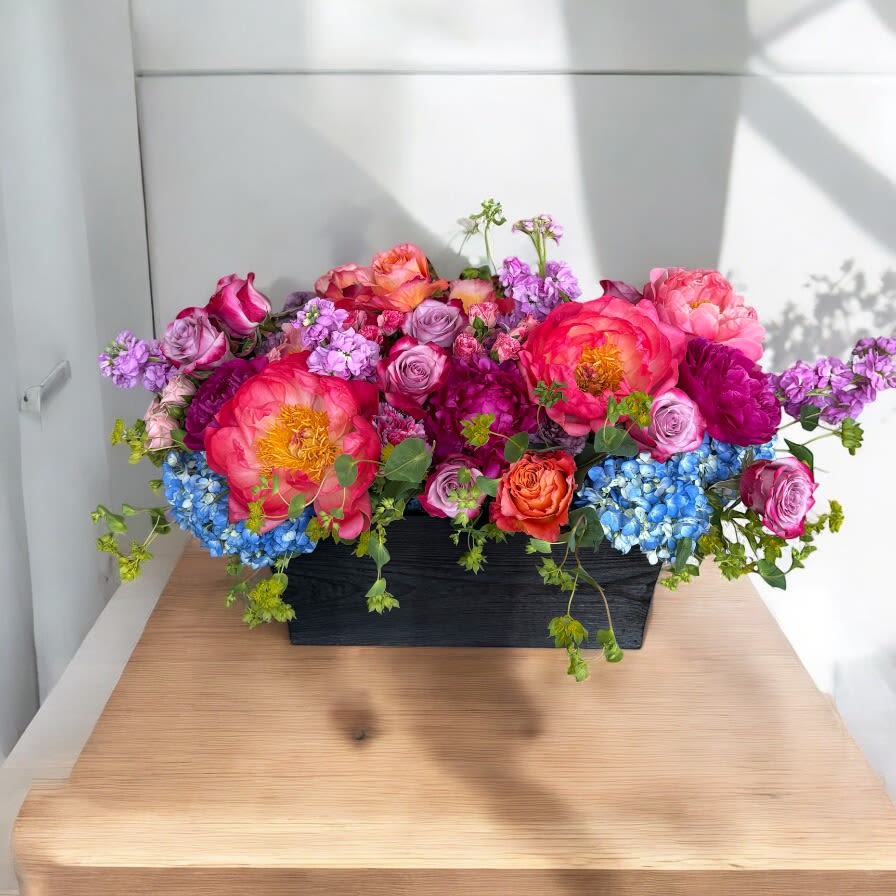 Let Us Impress - Stunning Colorful Blooms- mix of Hydrangeas, Peonies, Roses, Sweet Smelling Stock in a pretty planter This arrangement is 2' x 2' x 2'