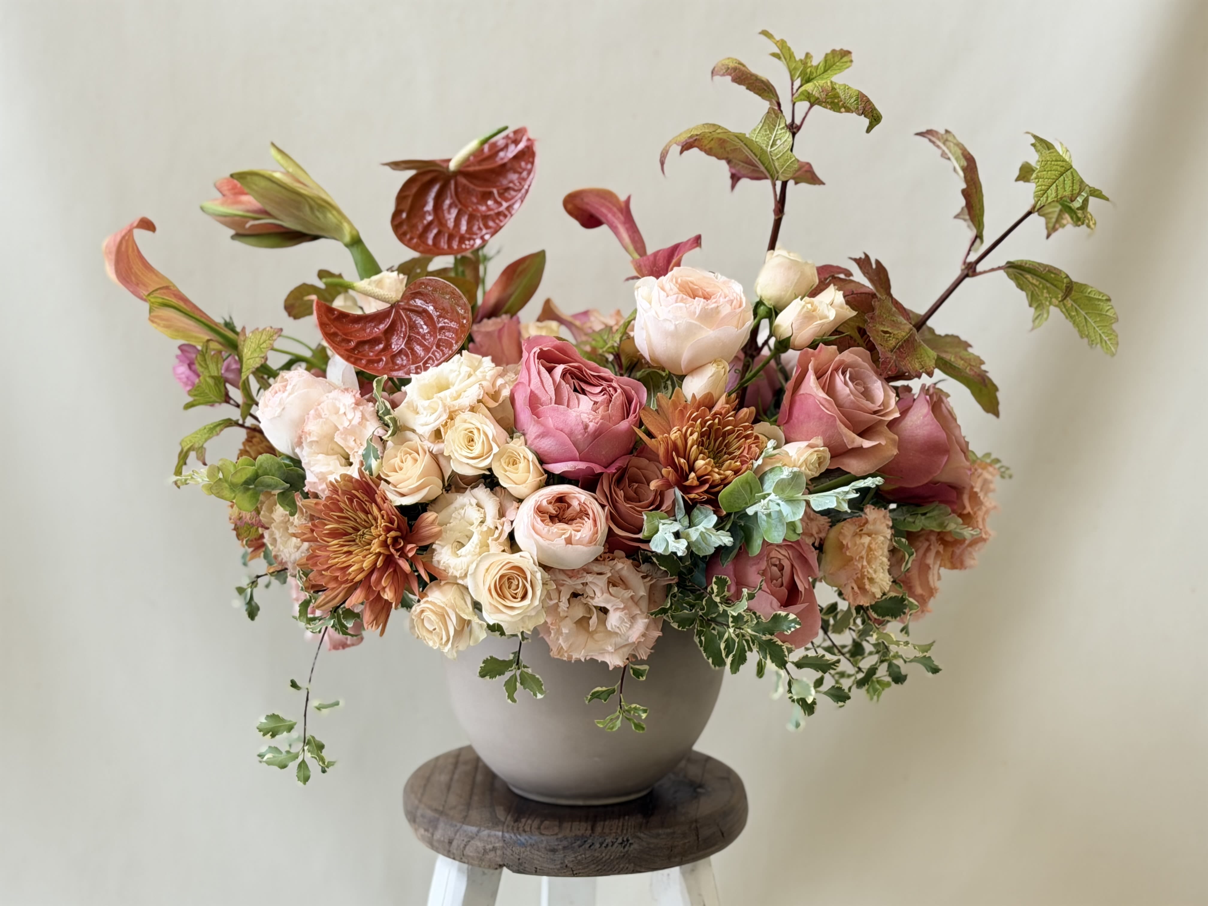 The just in time to give thanks arrangement. - She's autumn.  She thankful.  She's wanting to sit on your table.