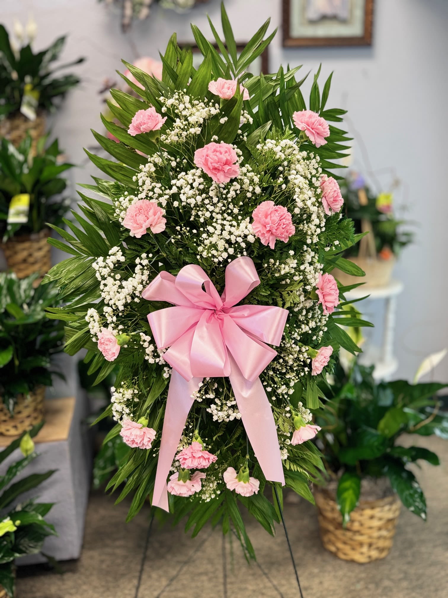 Pink Sympathy Standing Spray - This Sympathy Standing Spray in pink, is a beautiful symbol of your sympathy and support.