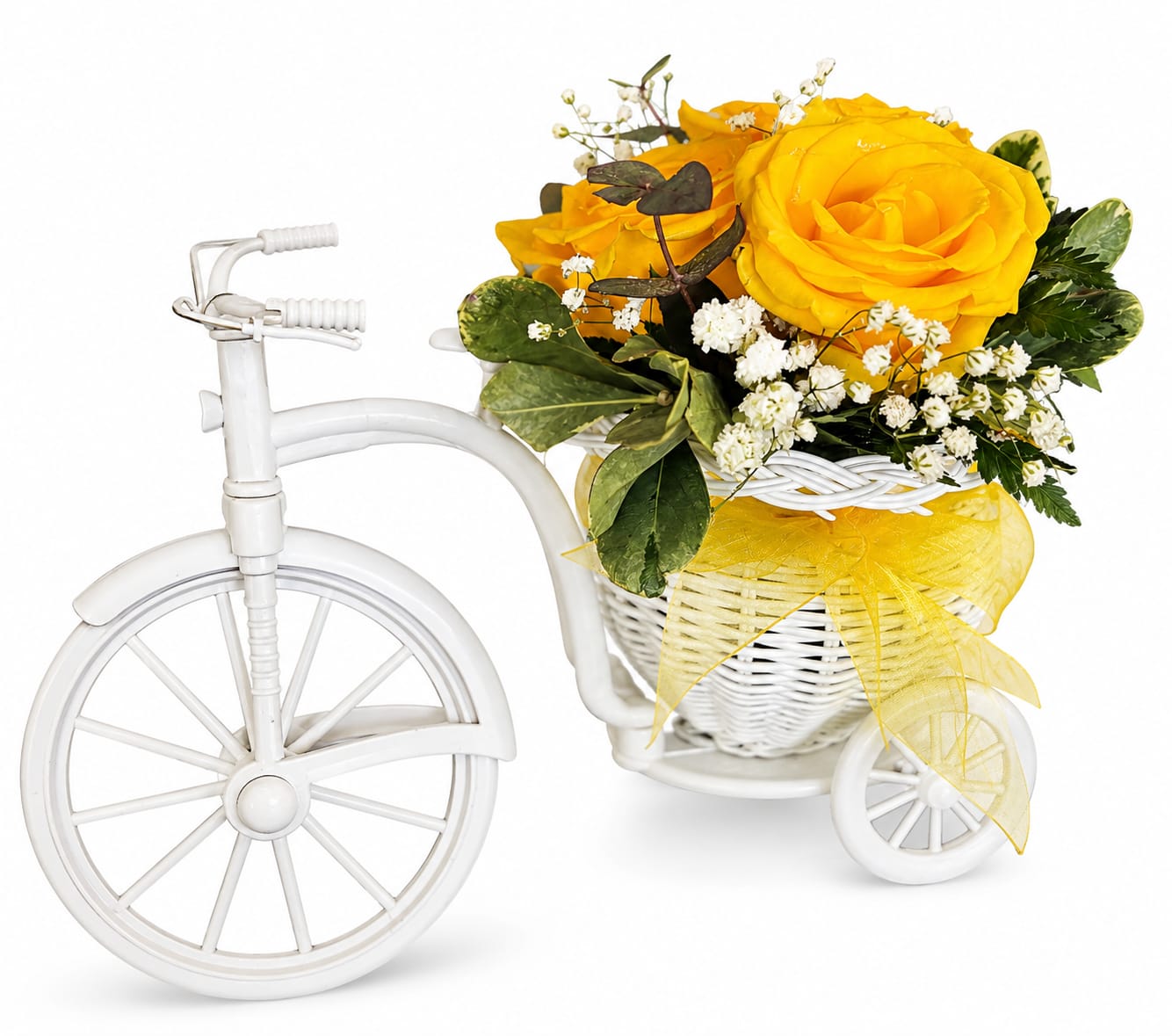 Yellow roses in a white tricycle basket with baby's breath