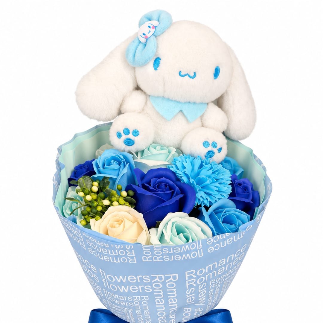 Plush bunny sitting in a bouquet of blue and cream roses