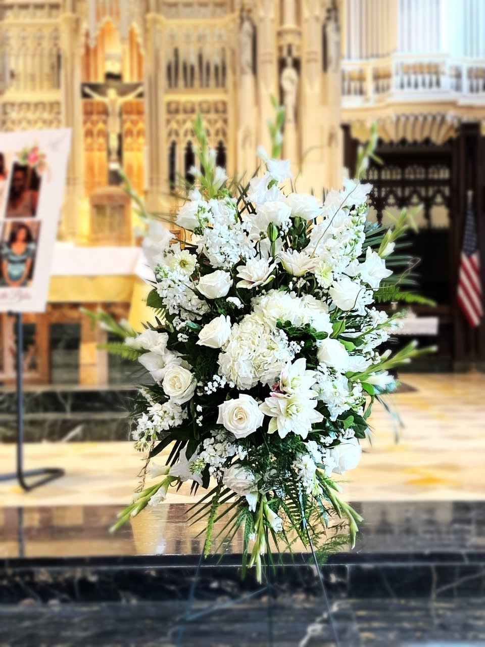 White Bliss standing funeral spray  - White Bliss Standing funeral spray is a beautiful crisp white elegant funeral piece. Hydrangea, gladiolus, roses,stock, plumosa and a touch of white lilies. This can be customized with any color. add instriuctions to your order.