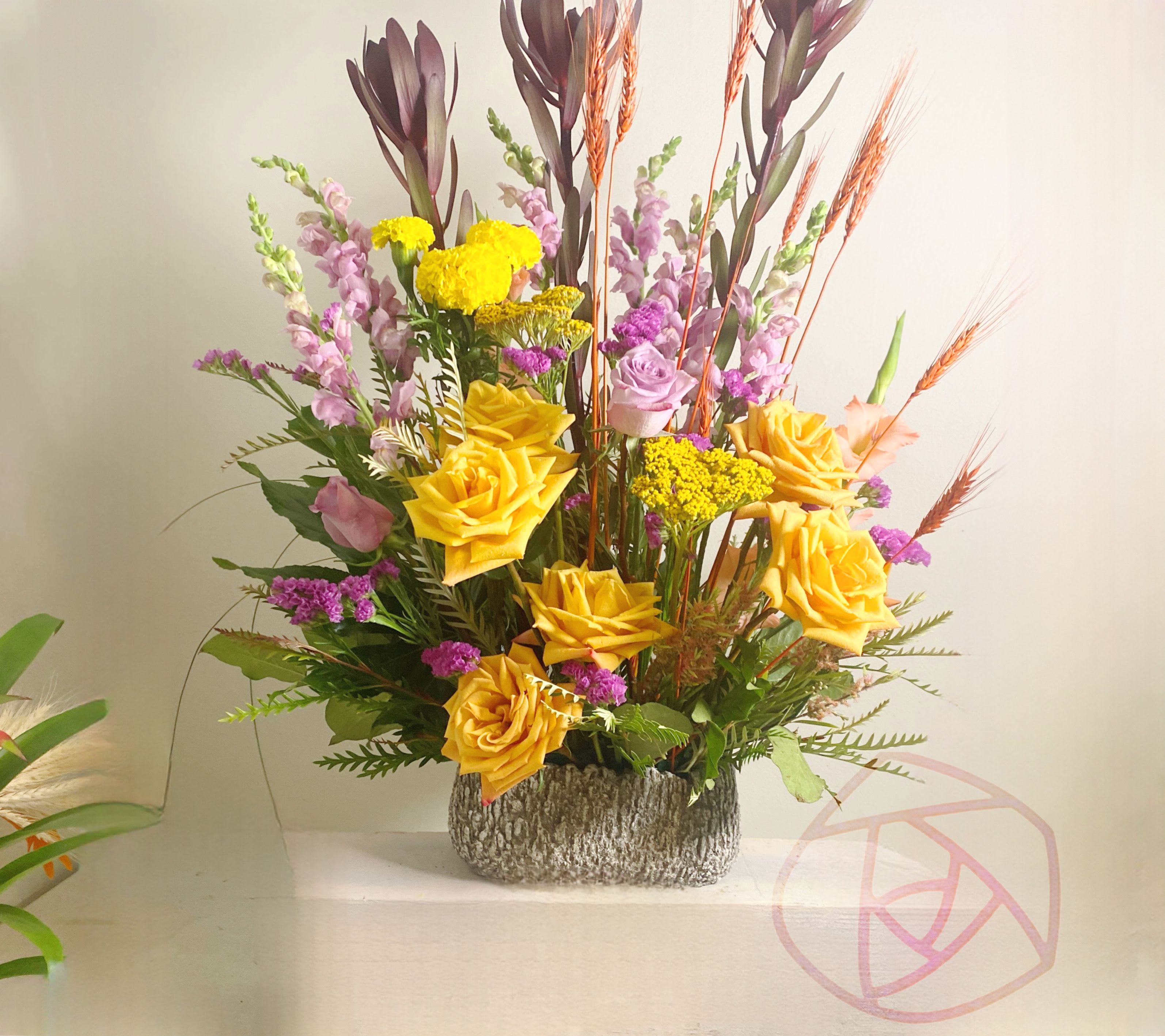 Heavenly Hedge - Heavenly Hedge is a standard 3 sided floor piece for a wake and/or funeral service. It is delivered in a funeral flat vessel that is easy to carry and take home after the service. The dominant colors are a pale orange and yellow with burgandy and lavender. Feel free to preorder with your desired 3 colors. 