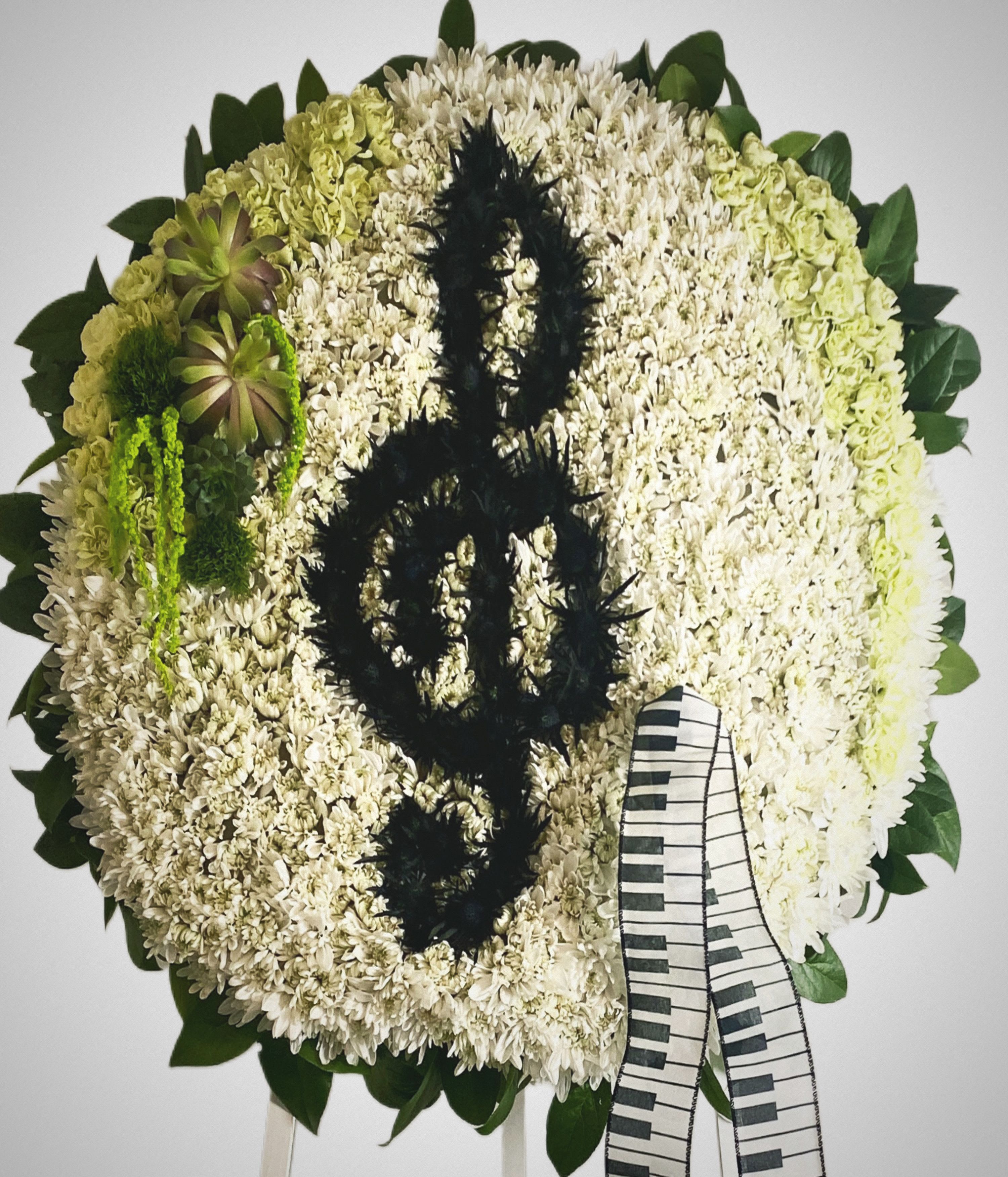 Standing Tribute easel - A large standing tribute custom made for your viewing, memorial and or/funeral. Themed for you and your service. This is a stunning piece and we can do any letter or symbol within artistic reason. Please order a few days ahead ; it takes time to process and open flowers for this floral design.   Please choose 3-4 colors. Put your special instructions when you check out and feel free to call and ask questions and discuss the design. 