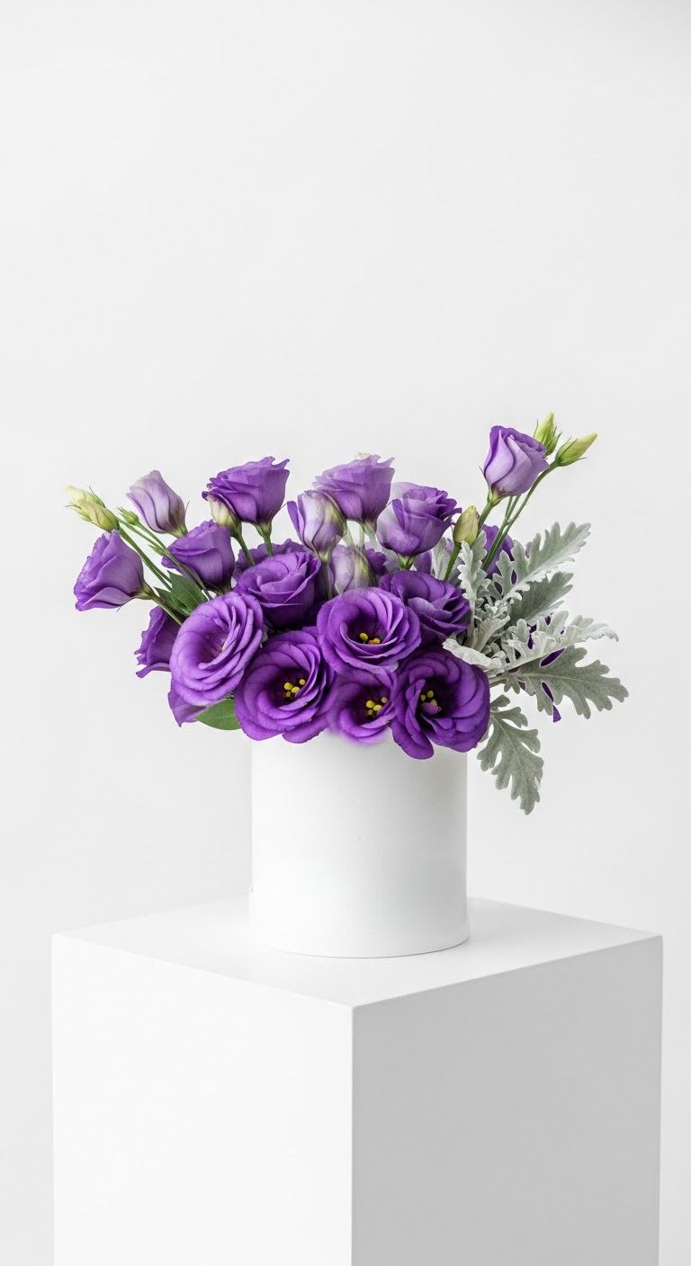 Lizzy Bouquet  - Purple lizianthus stylized and grouped in a white vessel. 