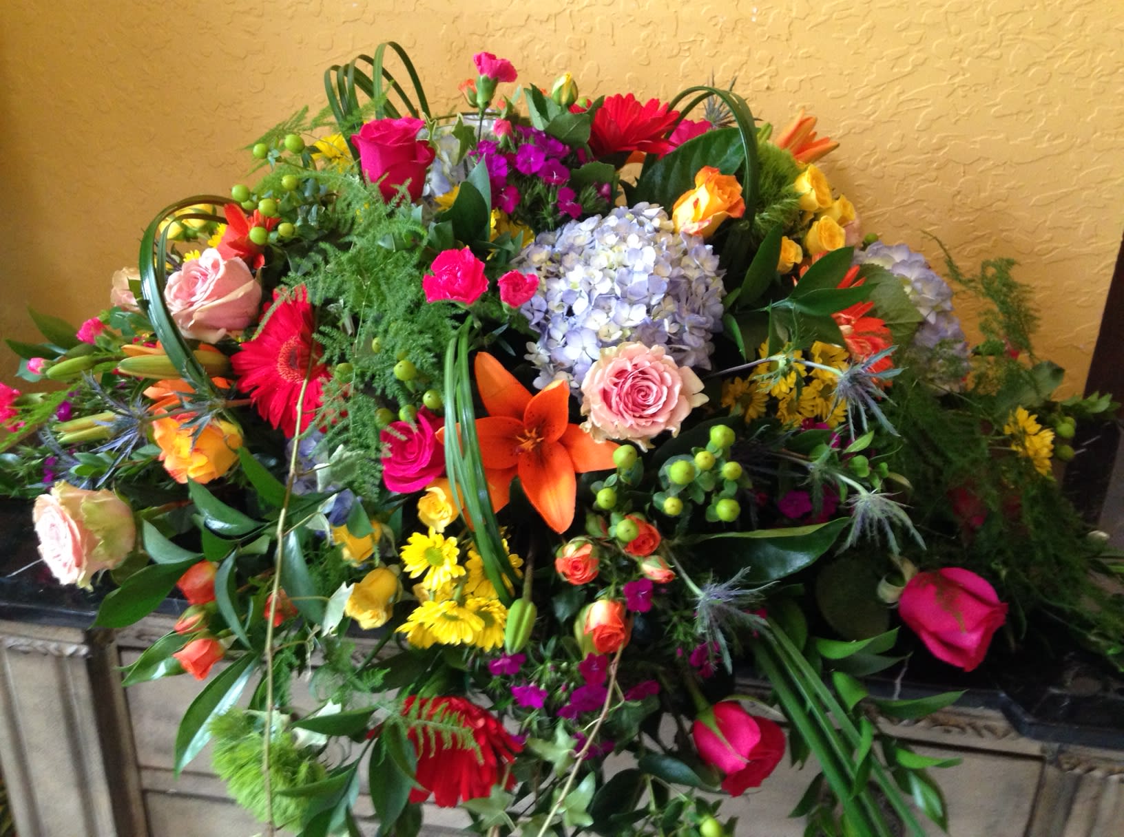 Large mixed bouquet with roses, lilies, hydrangea, and gerbera daisies
