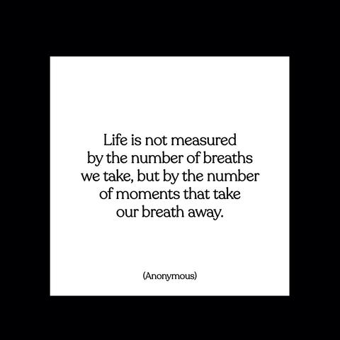 White quote card with black text on a black background