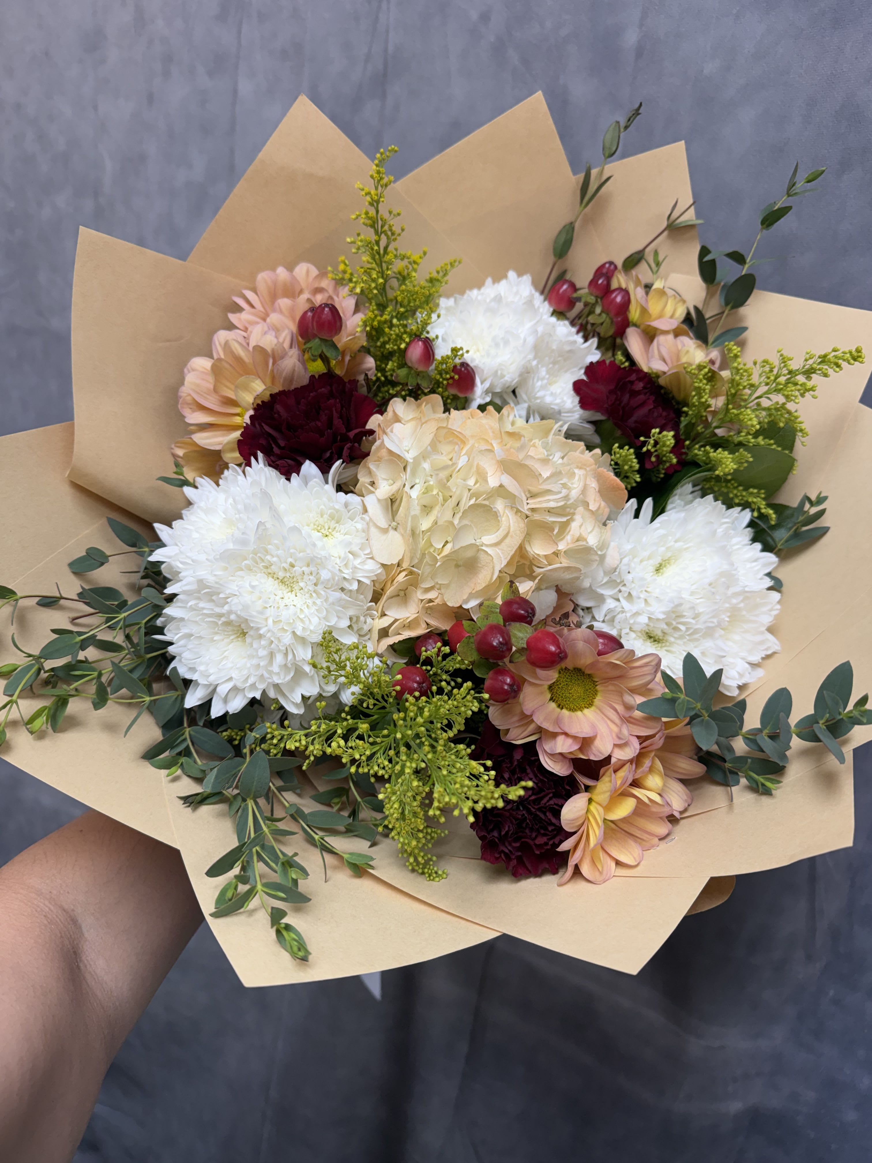 Autumn Blush Bouquet  - A charming blend of soft peach blooms, creamy hydrangea, white chrysanthemums, burgundy carnations, and seasonal greenery. Perfect for birthdays, thank you gifts, or simply brightening someone’s day.
