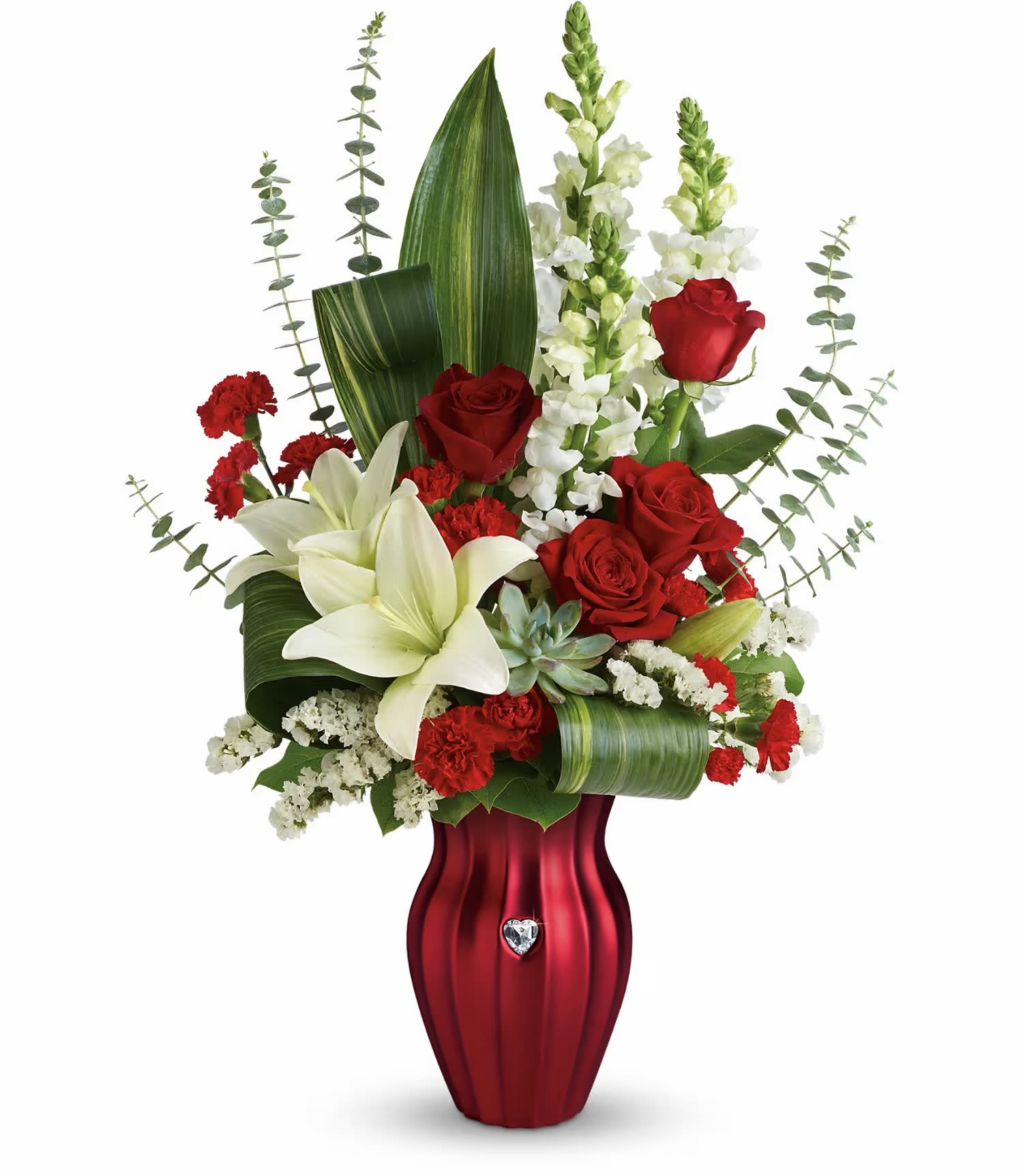 Hearts Aflutter Bouquet - A gift with heart! Make their heart flutter this Mother’s Day with a dramatic bouquet of radiant red roses, pure white lilies and snapdragons, lovingly hand-delivered in this elegant ceramic vase. Its luxurious satin texture and shimmering rhinestone heart make it a stylish keepsake they'll treasure forever!
