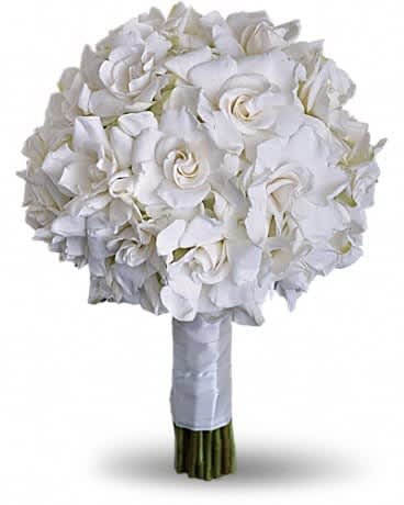 Gardenia and Grace Bouquet - Beloved for their enchanting fragrance, gardenias are gathered with hydrangea and roses into an elegant white bouquet. Gardenias and hydrangea are paired for a stunning all-white bouquet.