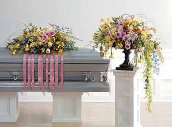 Multi-colored Casket Spray And Vase Arrangement - When we lose someone dear to us, we want to respond with a fitting gesture of respect and admiration. Our half casket cover and matching high end vase arrangement are crafted with care and artistry. (Type of vase is subject to availability.)
