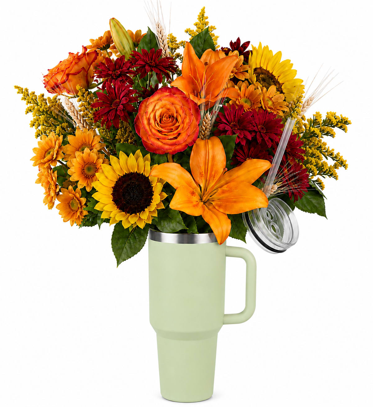 Bouquet of orange, red, and yellow flowers in a handled tumbler vase