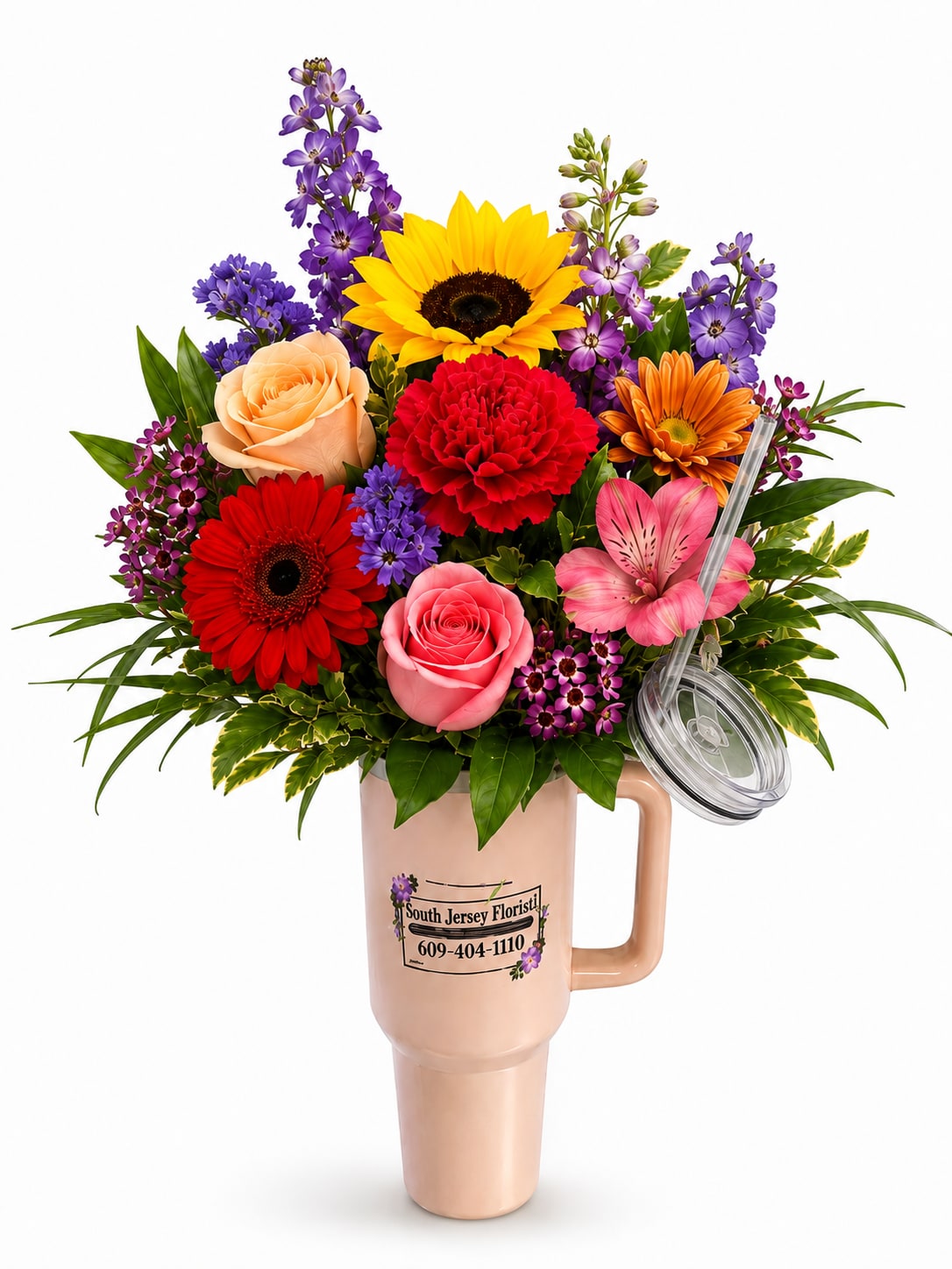 Colorful bouquet in a handled tumbler with a clear lid and straw