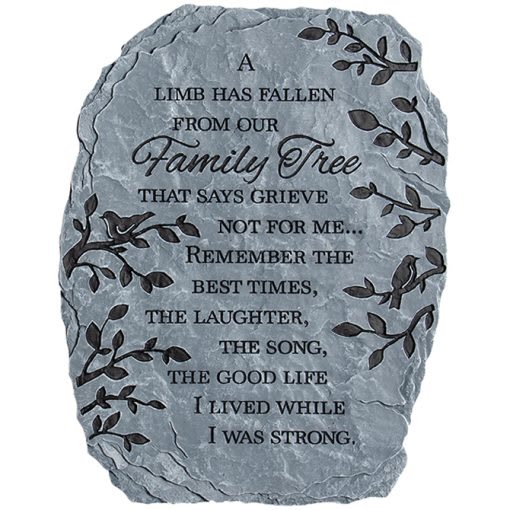 Gray memorial stone with engraved text and leaf designs