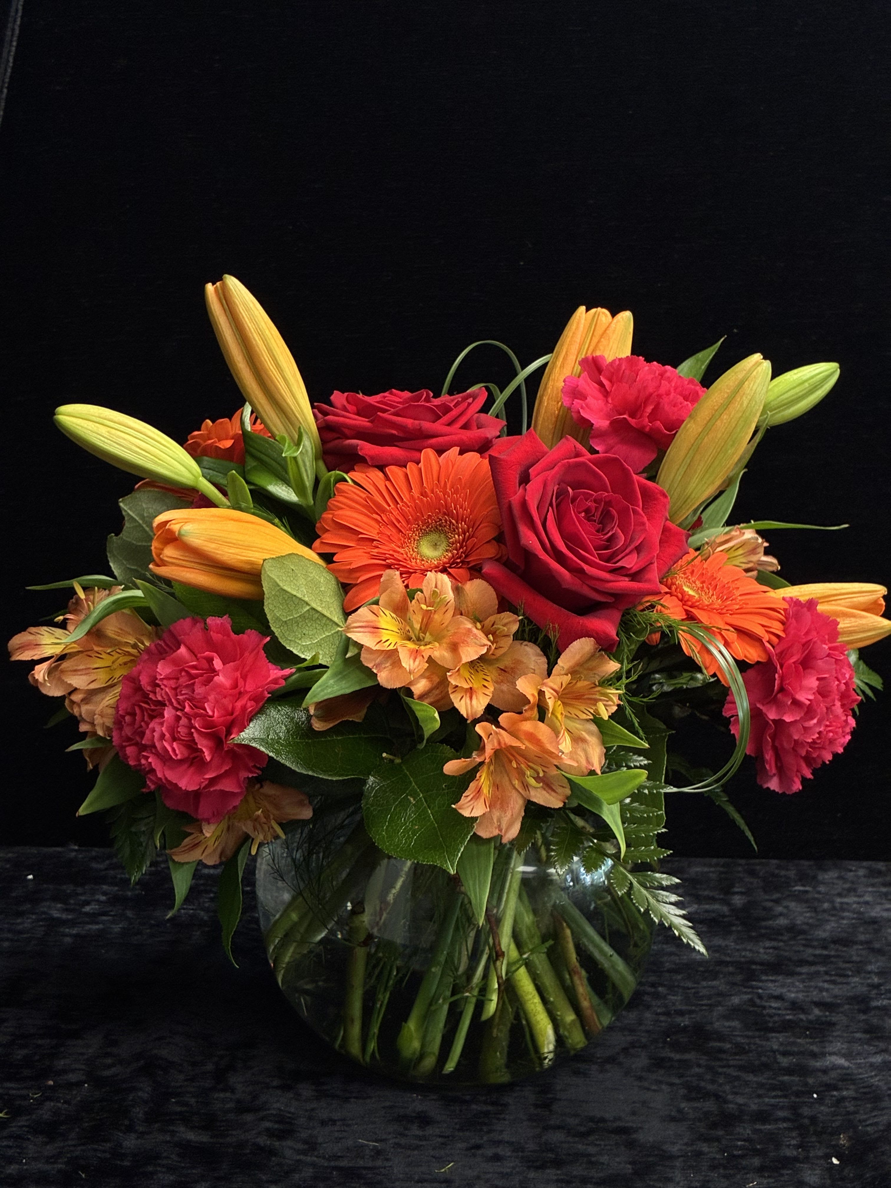 Bowl of Beauty - A bright arrangement of Roses, Carnations, Lily, Gerber Daisy, and Alstromeria.