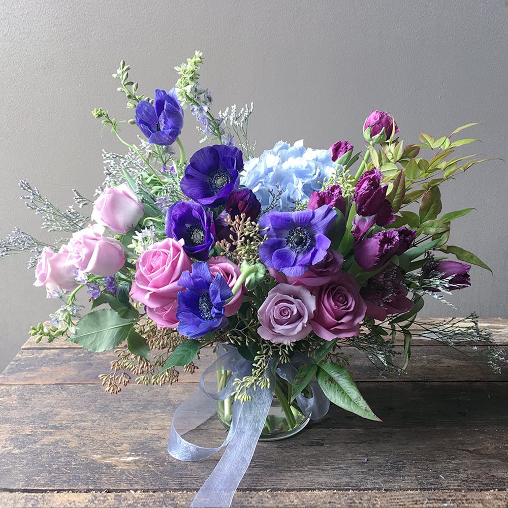 Paran (Gallery Photo) - Send these gorgeous blooms in stunning hues of blues and purples! This will delight any creative soul with its slightly unusual, very unique and artistic botanical expression!