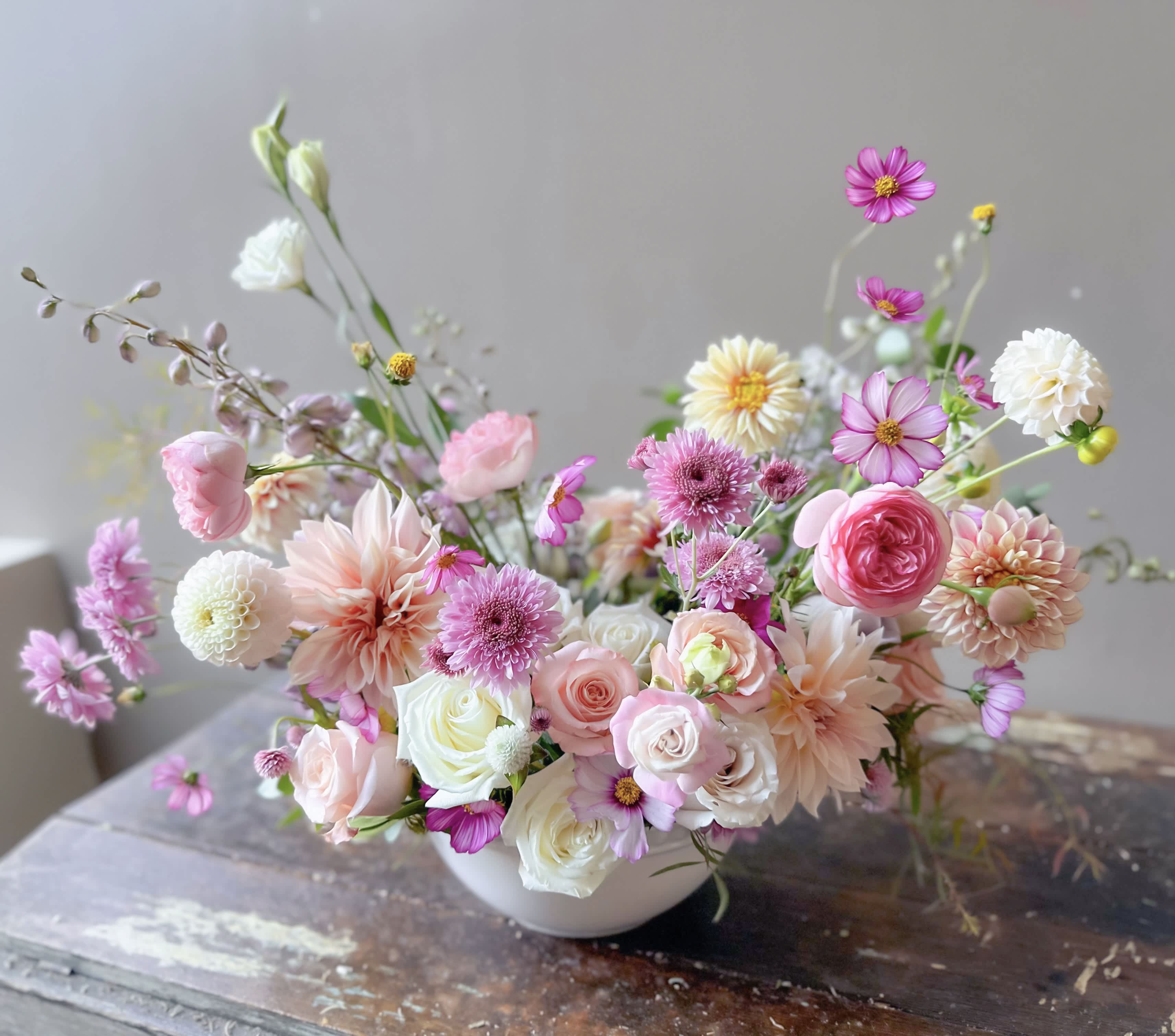 Sucre (Gallery Photo) - Send these sweetest blooms gathered artfully in a ceramic bowl. It’s filled with creams, pinks and blush, just perfectly delightful in every sense!