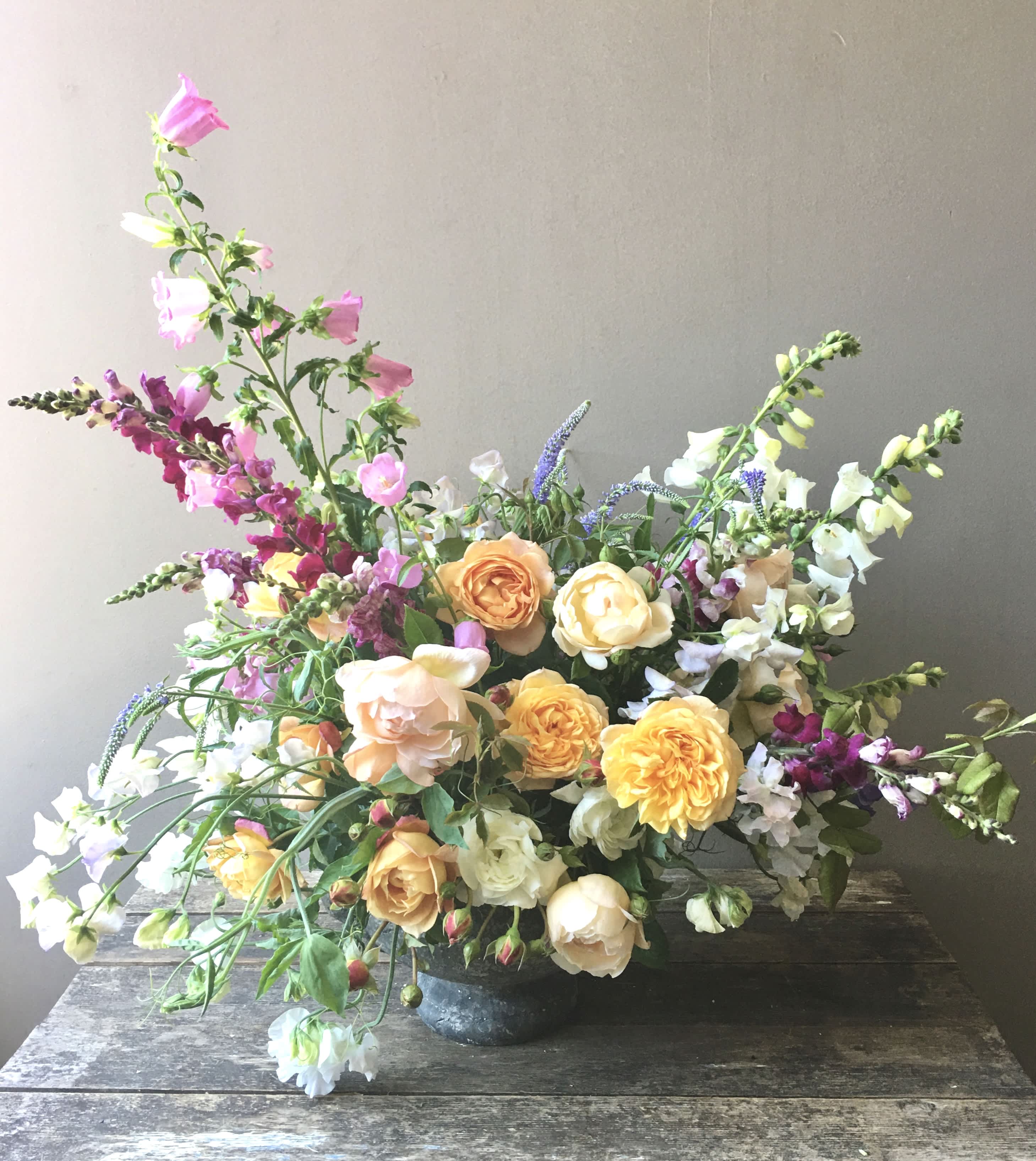 Toscana (Gallery Photo) - A large floral arrangement with garden roses and so much more! This beautiful expression of nature's blooms will bring light and love to any surroundings and to all who come to immerse in its beauty!