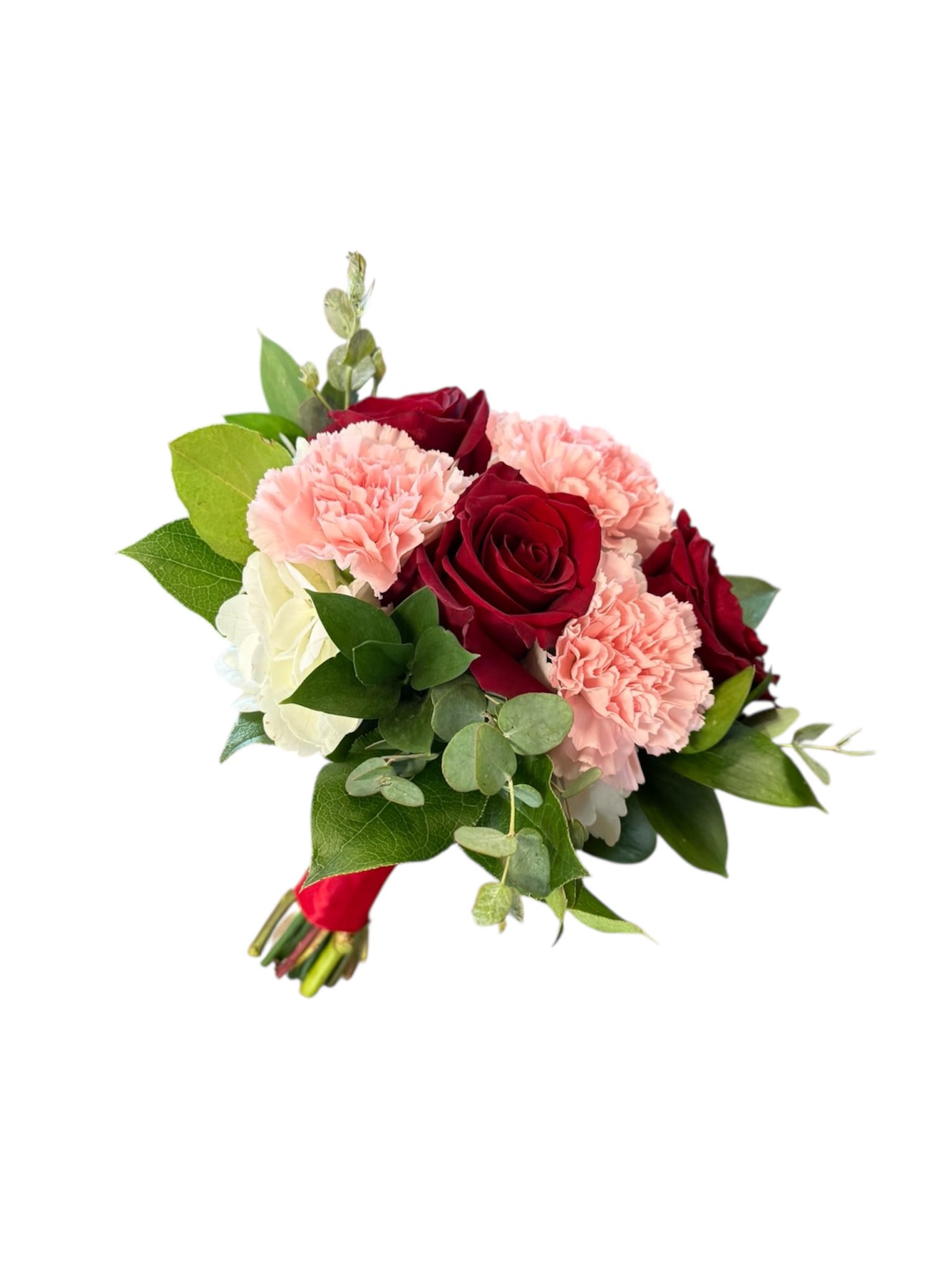 Bouquet of red roses and pink carnations with greenery