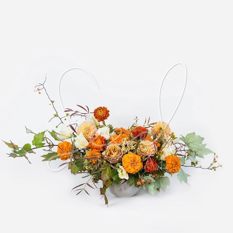 Autumns Up! - Celebrate the season with Autumns Up, a lush mix of orange, amber, and cream blooms inspired by autumn’s golden hues. Handcrafted with premium seasonal flowers and textured foliage, this arrangement adds warmth and elegance to any table or fall gathering. Perfect for home décor, Thanksgiving, or gifting.