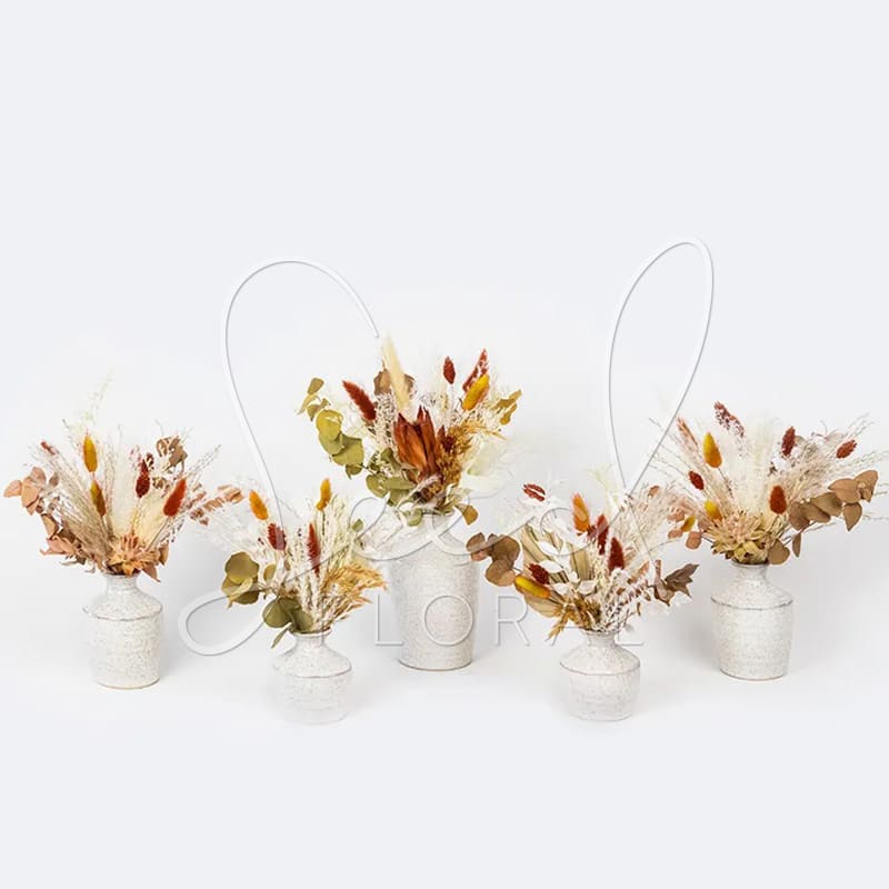 Everlasting Bud Vases- Autumn  - Enjoy this festive set of autumnal preserved blooms arranged in assorted Hari Cream Speckled bud vases. Perfect for sprinkling little pops of fall throughout your home for the holidays. No Fuss, No Maintenance Needed.  NOT Sold individually  Small vase (pictured): 3.25" diameter x 3.5" tall Medium vase: 3.25" diameter x 4.5" tall Large vase: 3.75" diameter x 6.25" tall Standard includes in a set of 3 bud vases  Deluxe includes 4 bud vases  Premium includes 5 bud vases 