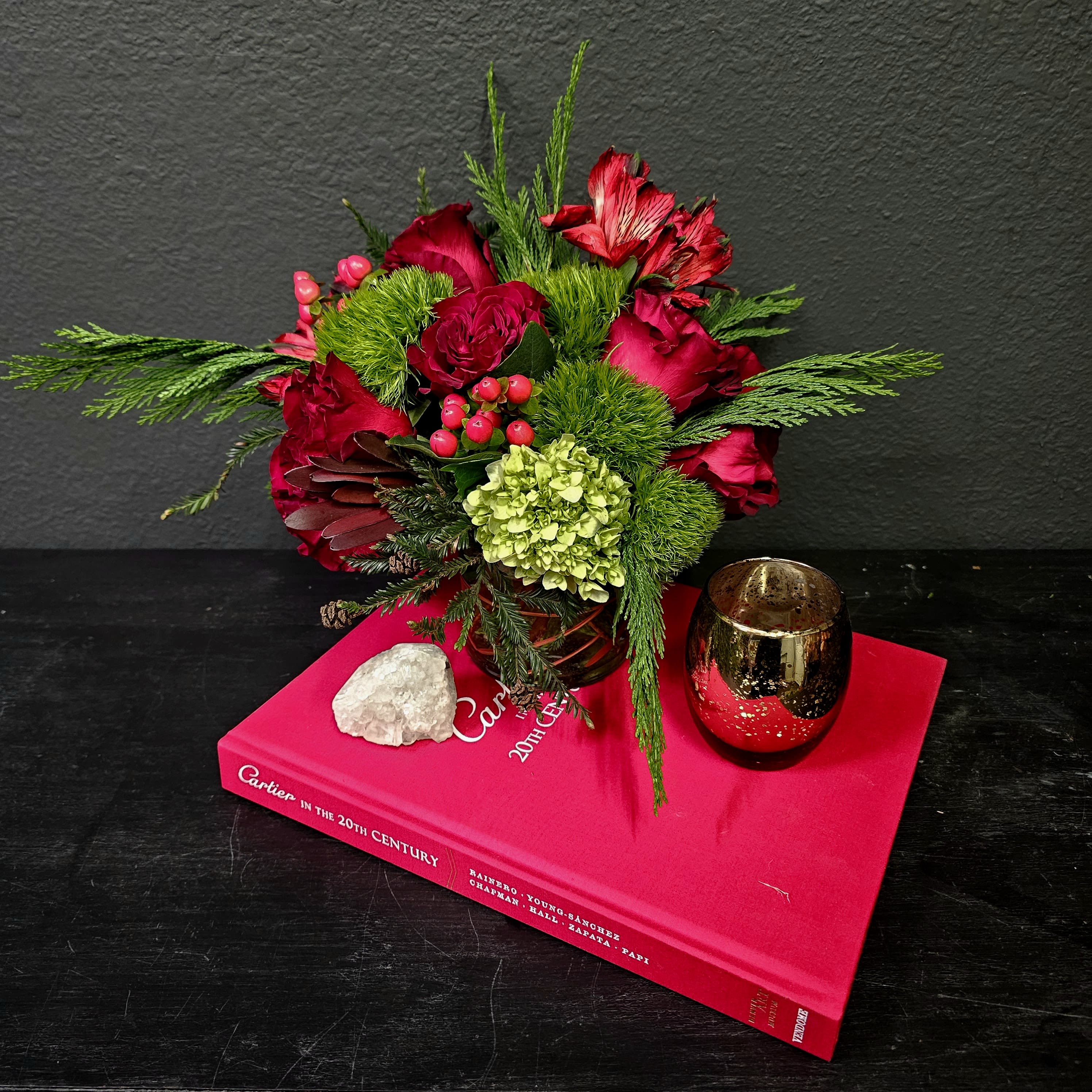 Crimson Crush - Hypericum berries, fresh seasonal greens, red heart roses, alstoemeria, kermit hydrangea. That's everything on my favorites list, how about yours? This arrangement makes for the perfect Christmas dinner centerpiece, Valentine's Day Love-Maker rich with reds and greens, perfect for the season!  All of Zalea's arrangements are designed with the freshest ingredients. If we happen to be out of a type of bloom, or a color (or if they're not the freshest), our team will reach out to let you know what the substitution options are! Substitutions can happen with all fresh product - so we make sure you have the freshest possible arrangements.