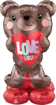 Bear-shaped balloon holding a red heart that says LOVE YOU
