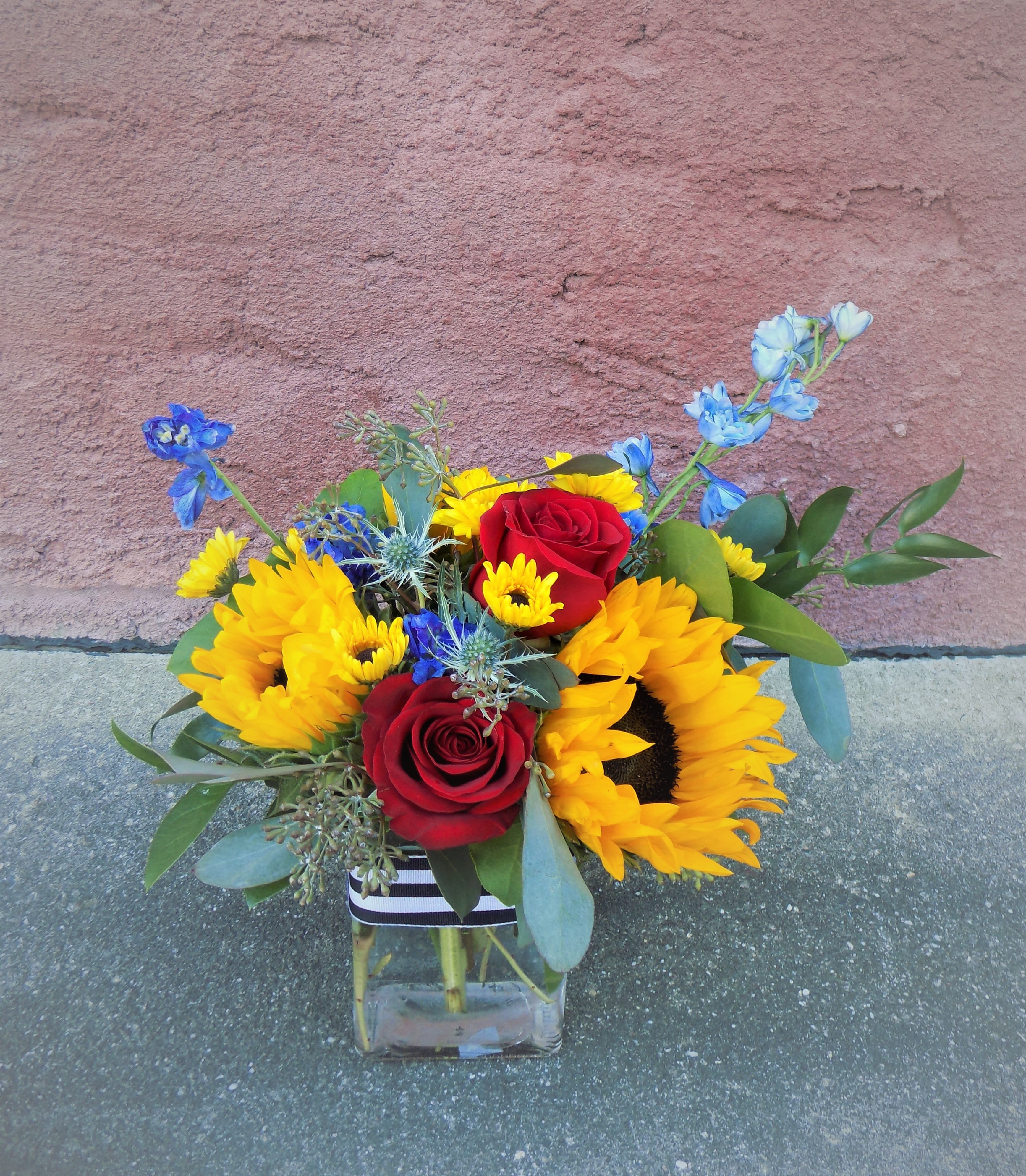 Smart &amp; Stylish - A fun bouquet bursting with the primary colors of blue, red and yellow...perfect for any occasion! 